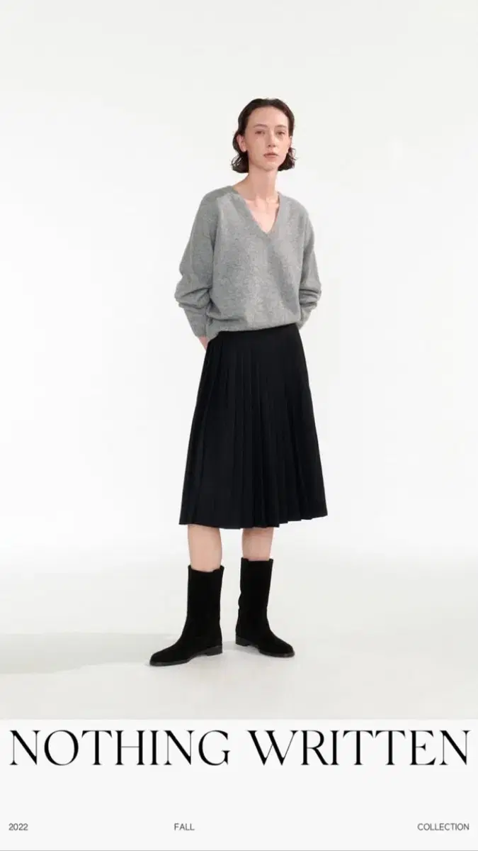 낫띵리튼 Classic pleated mid-skirt